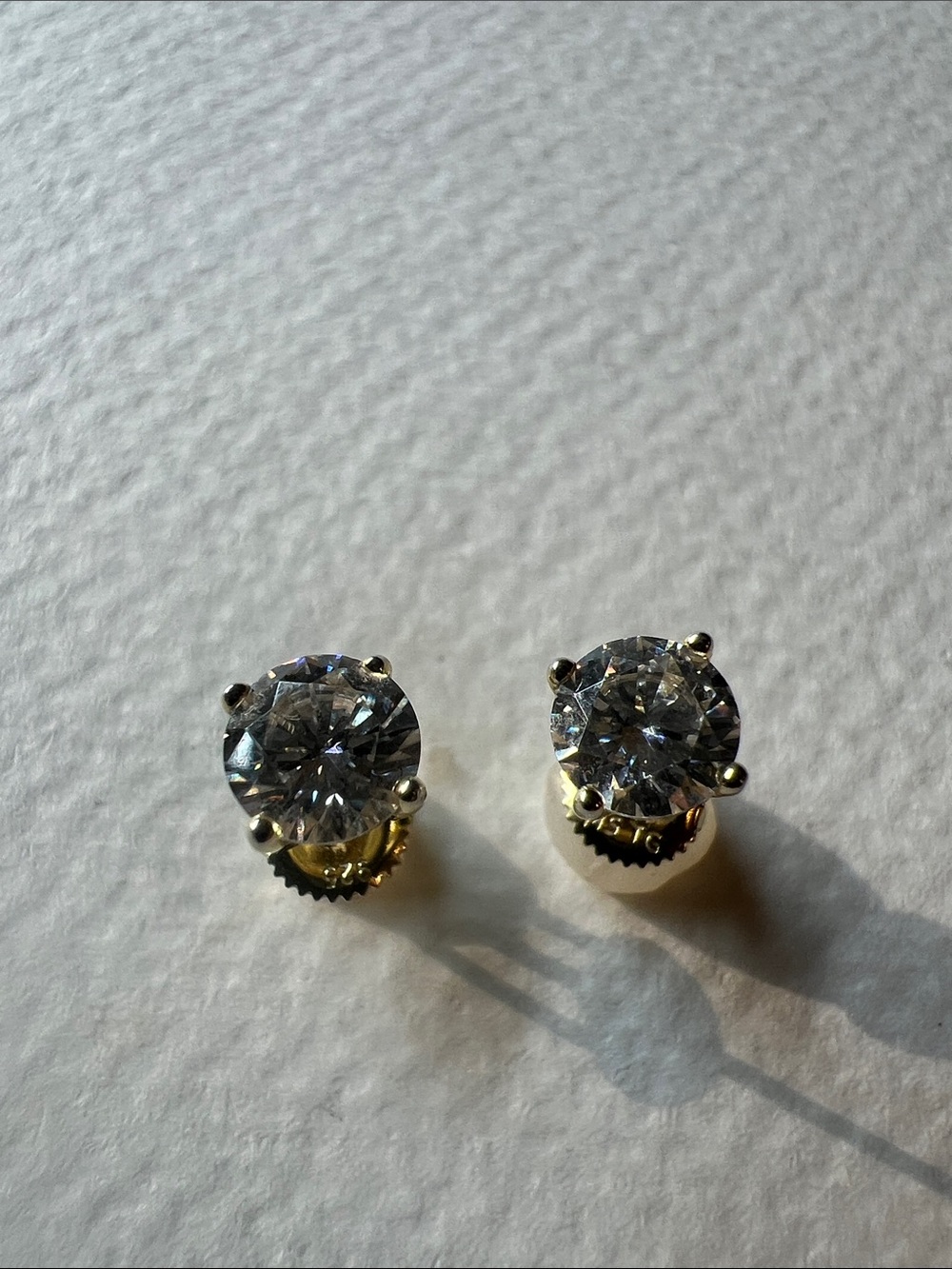 Sterling Silver Clear Stone Stud Earrings in Gold-Tone Setting